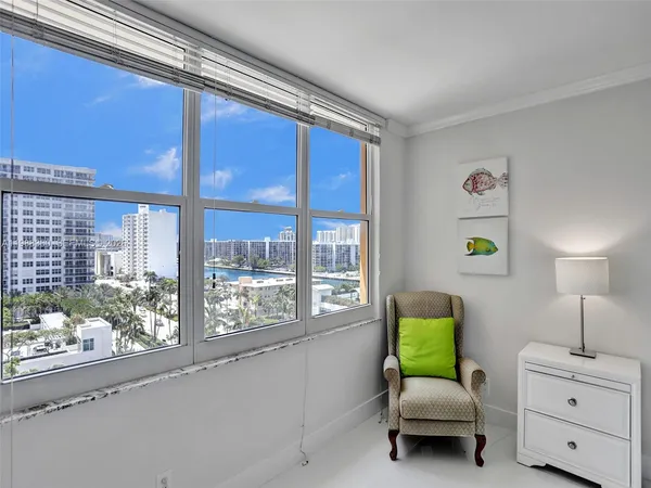 a view of a chairs and table in a backyard