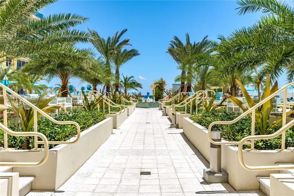 a kitchen with a table and chairs in it