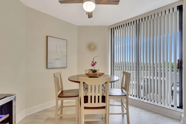 a kitchen with stainless steel appliances a sink stove and cabinets