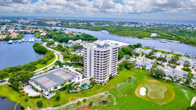 an aerial view of a golf course with chairs