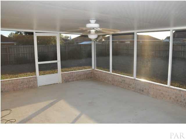 7147 Jennifer Road Pensacola, FL 32526 - Photo 11 of 11 Screened Porch overlooking back yard:7147 Jennifer Rd Pensacola FL