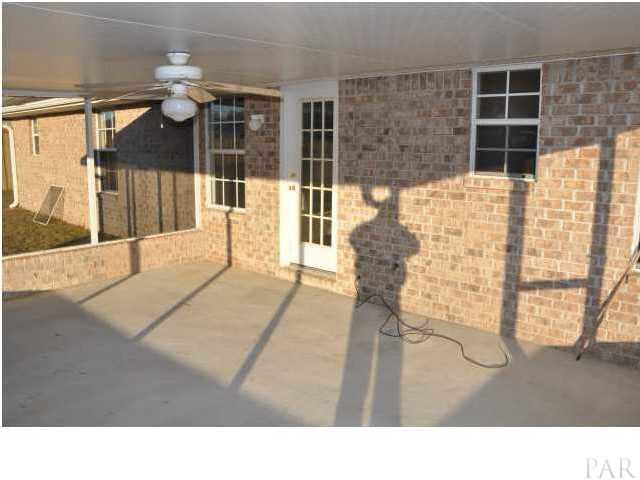 7147 Jennifer Road Pensacola, FL 32526 - Photo 9 of 11 Enjoy lazy days on the screened porch:7147 Jennifer Rd Pensacola FL