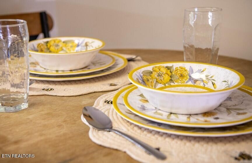535 Orchard Valley Way Sevierville, TN 37862 - Photo 11 of 26 a view of a swimming pool with a dining table and chair