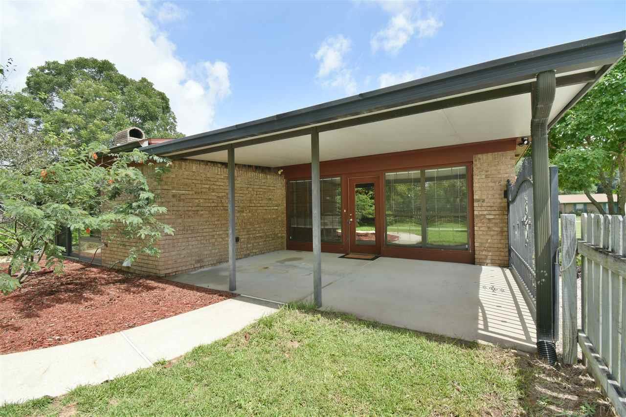 Covered and gated carport
