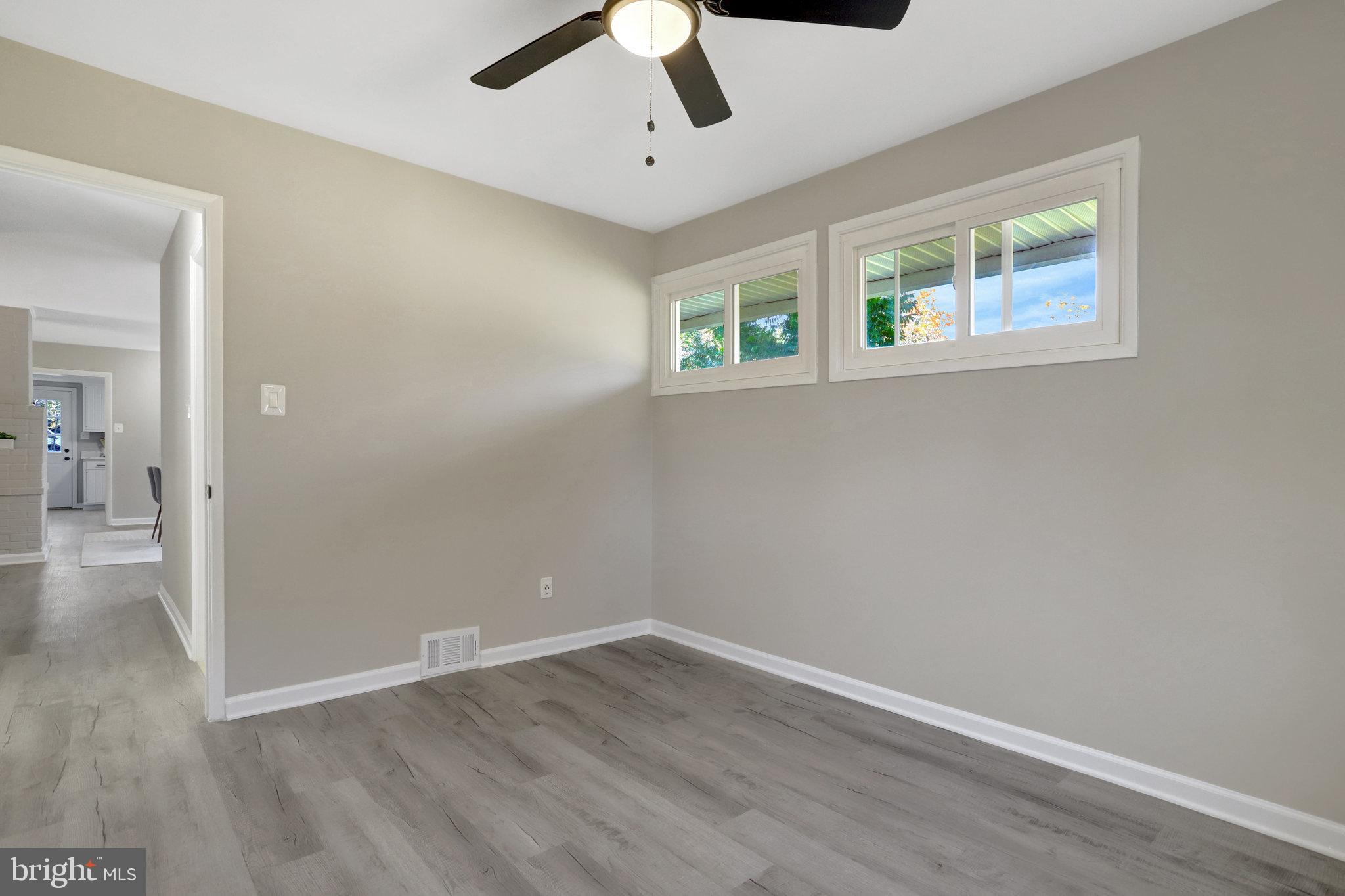 5301 Ferndale Street Springfield, VA 22151 - Photo 22 of 32 wooden floor in an empty room with a window