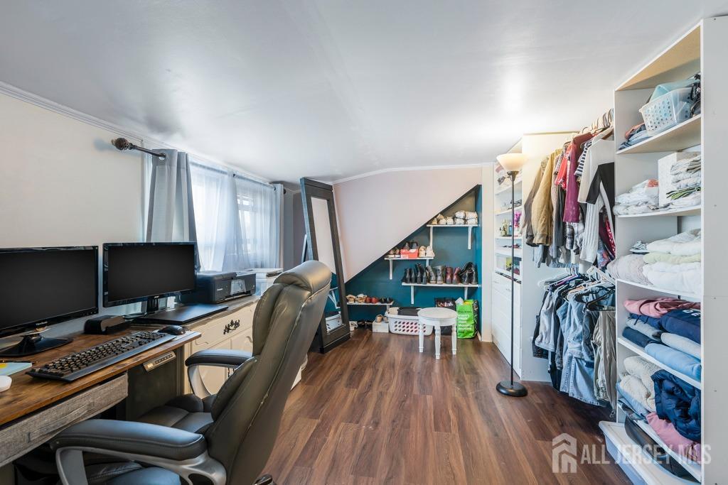 14 Grandview Street Middlesex, NJ 08846 - Photo 19 of 28 a view of walk in closet with clothes and shoes