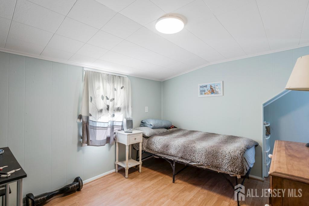 14 Grandview Street Middlesex, NJ 08846 - Photo 20 of 28 a bedroom with a bed and a window