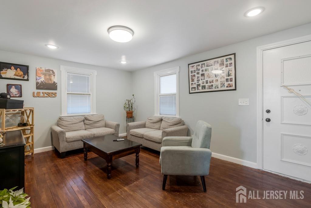 14 Grandview Street Middlesex, NJ 08846 - Photo 5 of 28 a living room with furniture and a wooden floor