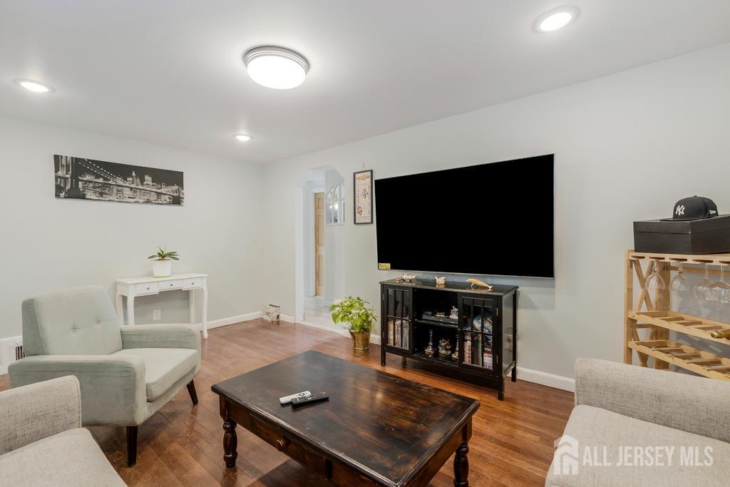 14 Grandview Street Middlesex, NJ 08846 - Photo 7 of 28 a living room with furniture and a flat screen tv