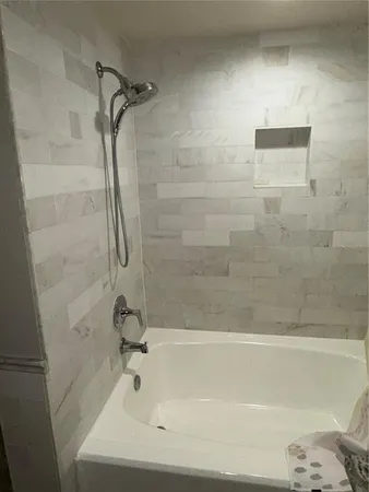 a bathroom with a bathtub