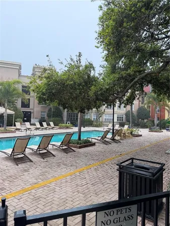 a view of a yard with sitting area