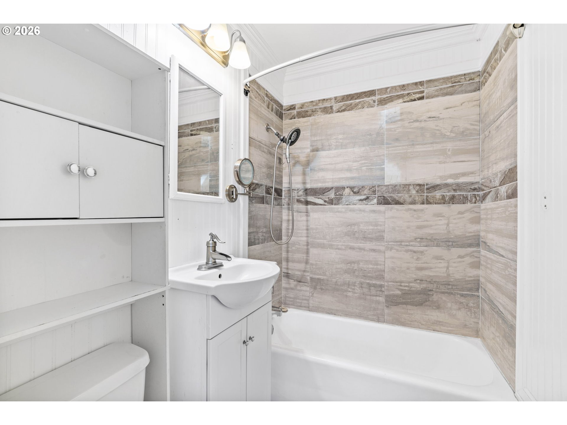 830 South 7th Street Cottage Grove, OR 97424 - Photo 15 of 33 a bathroom with a sink mirror toilet and bathtub