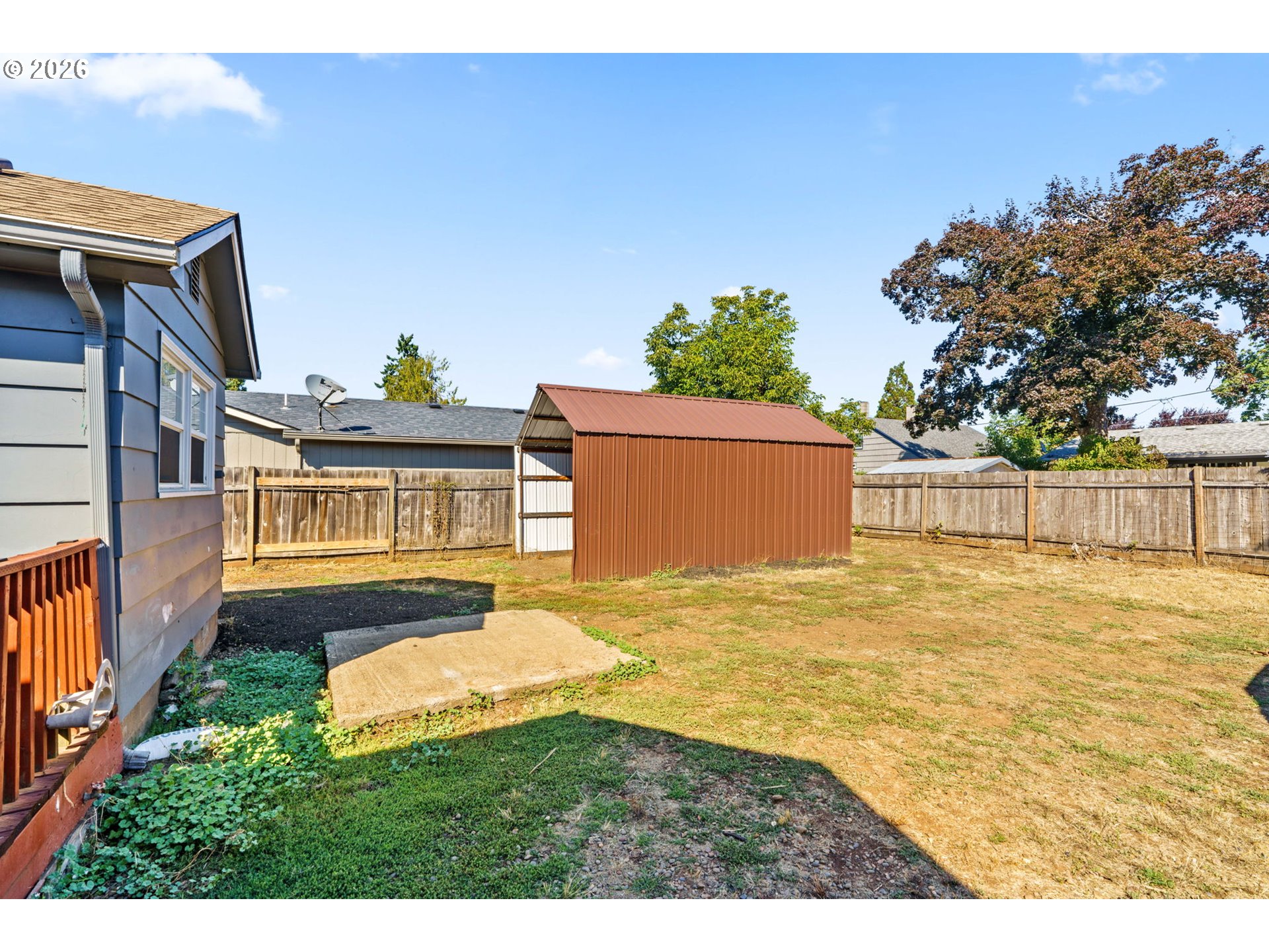 830 South 7th Street Cottage Grove, OR 97424 - Photo 16 of 33 a view of a backyard with a garden and yard