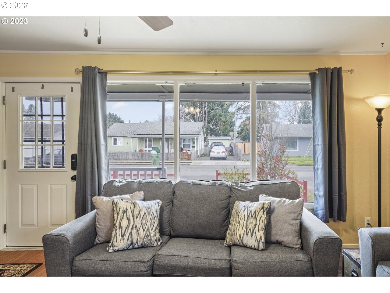 830 South 7th Street Cottage Grove, OR 97424 - Photo 26 of 33 a living room with furniture and a large window