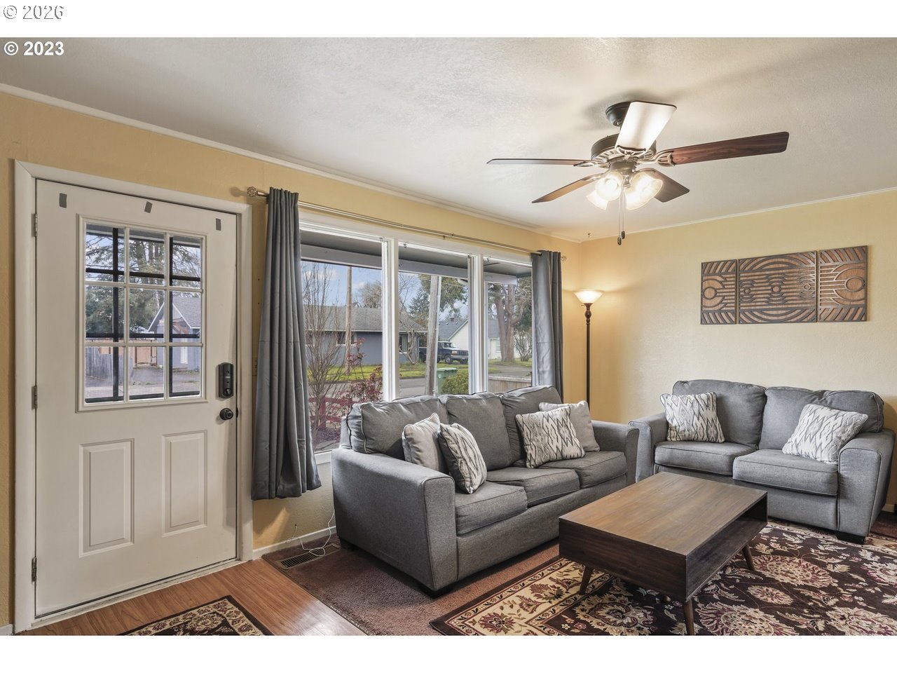 830 South 7th Street Cottage Grove, OR 97424 - Photo 28 of 33 a living room with furniture and a large window