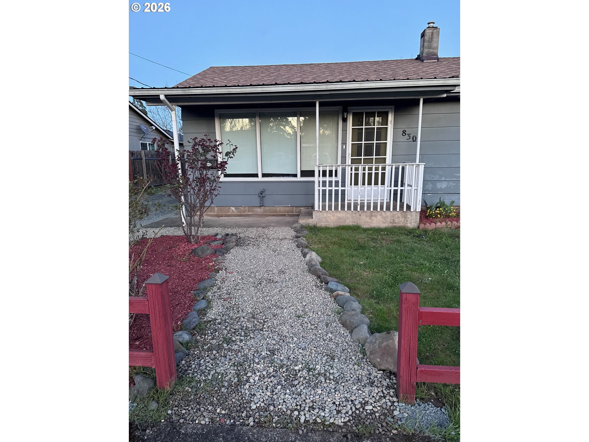 830 South 7th Street Cottage Grove, OR 97424 - Photo 32 of 33 a house view with a backyard space