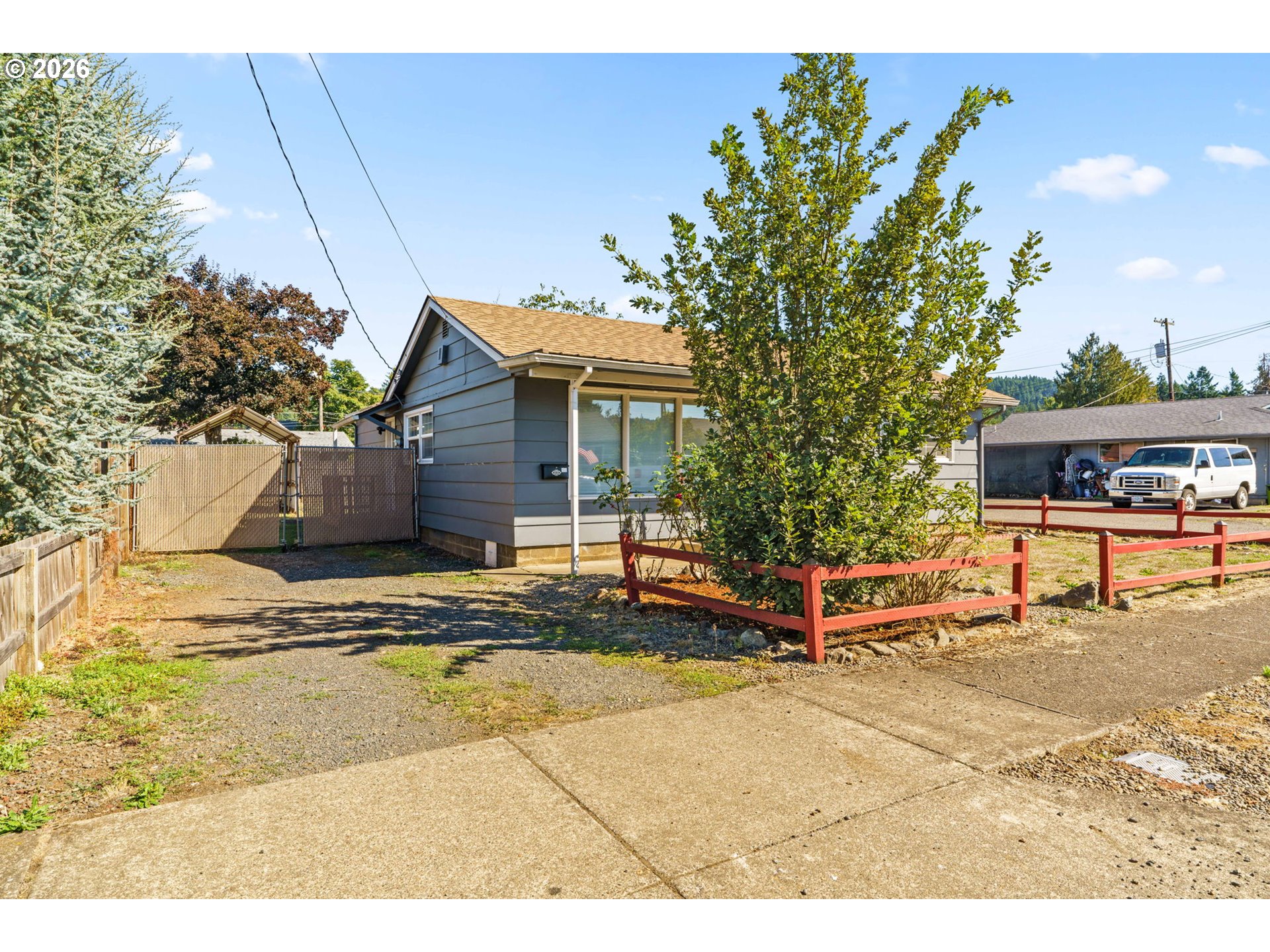 830 South 7th Street Cottage Grove, OR 97424 - Photo 4 of 33 a view of a house with a patio