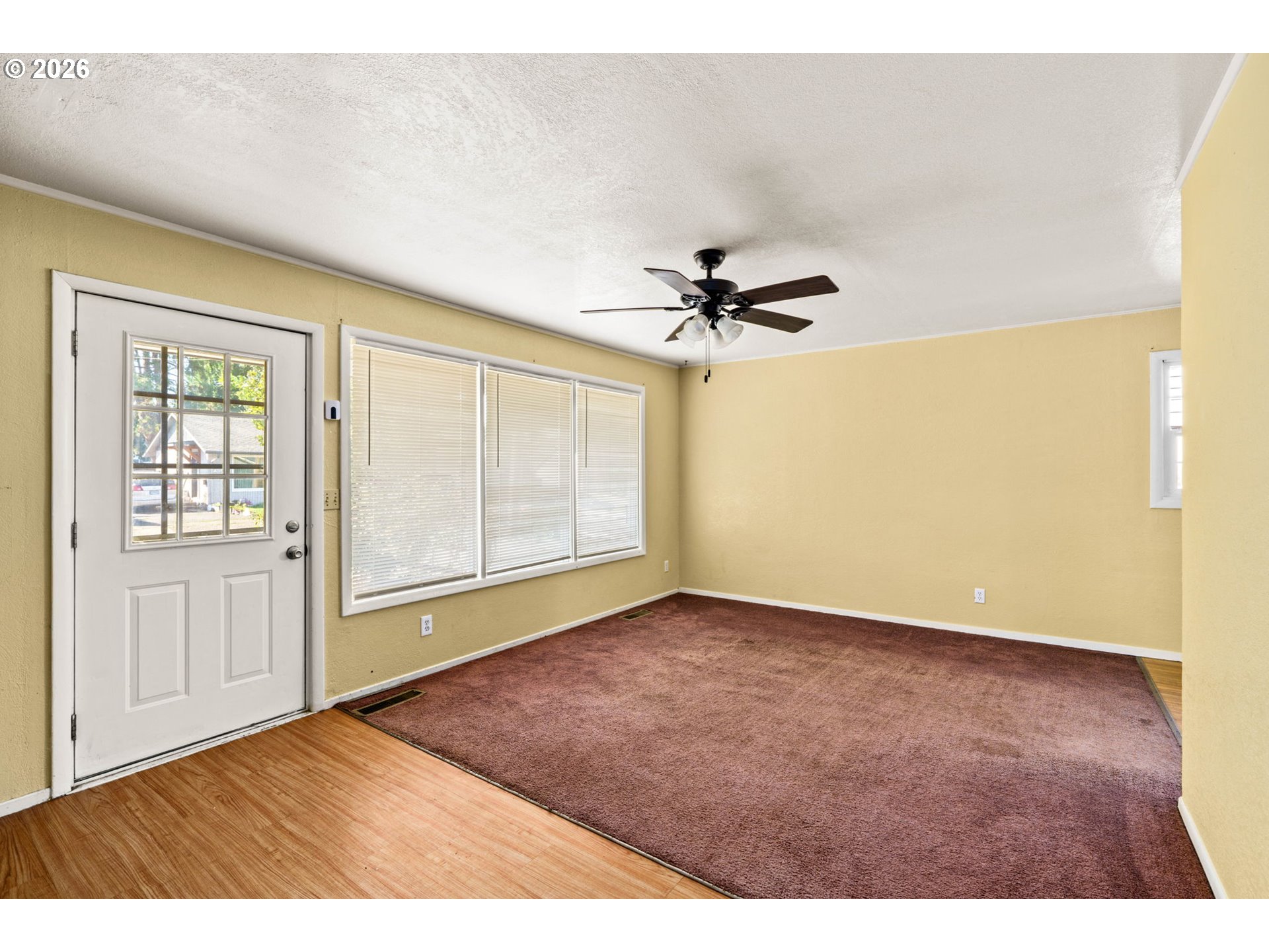 830 South 7th Street Cottage Grove, OR 97424 - Photo 6 of 33 a view of an empty room with a window
