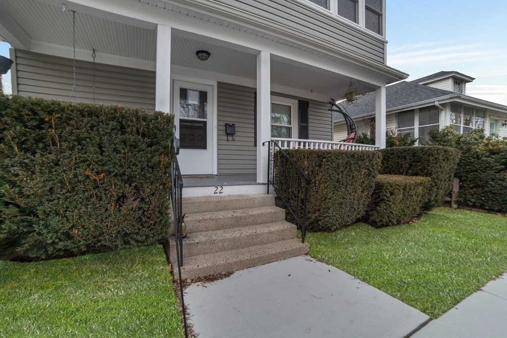 22 Ridgeway Street, Unit 2 Quincy, MA 02170 - Photo 15 of 15 a view of a house with a garden