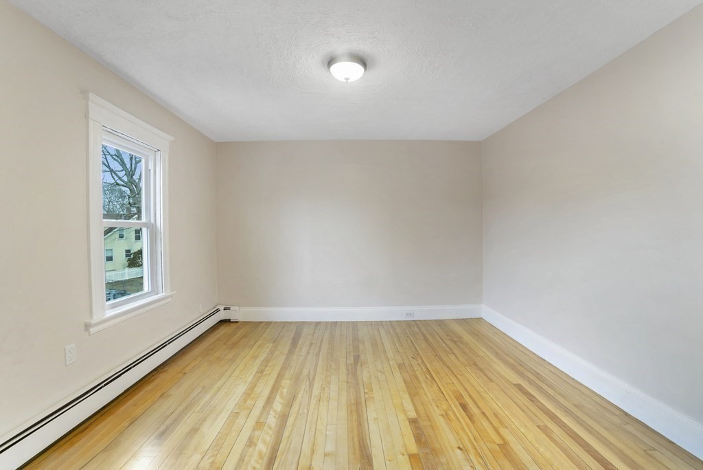 22 Ridgeway Street, Unit 2 Quincy, MA 02170 - Photo 8 of 15 wooden floor in a room