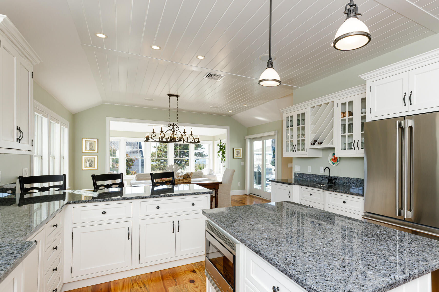 27 Patterson Road Chatham, MA 02633 - Photo 14 of 68 a kitchen with stainless steel appliances granite countertop a sink a stove and refrigerator
