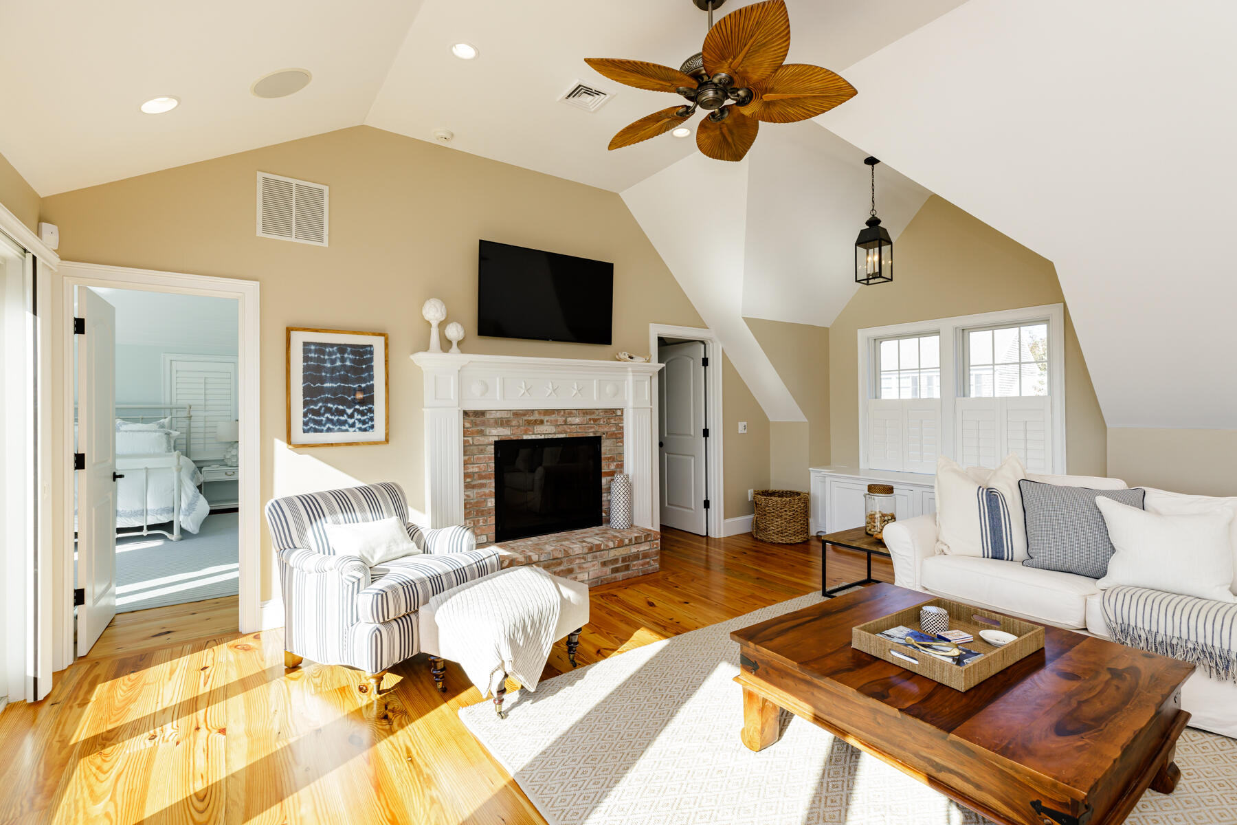 27 Patterson Road Chatham, MA 02633 - Photo 18 of 68 a living room with furniture and a fireplace