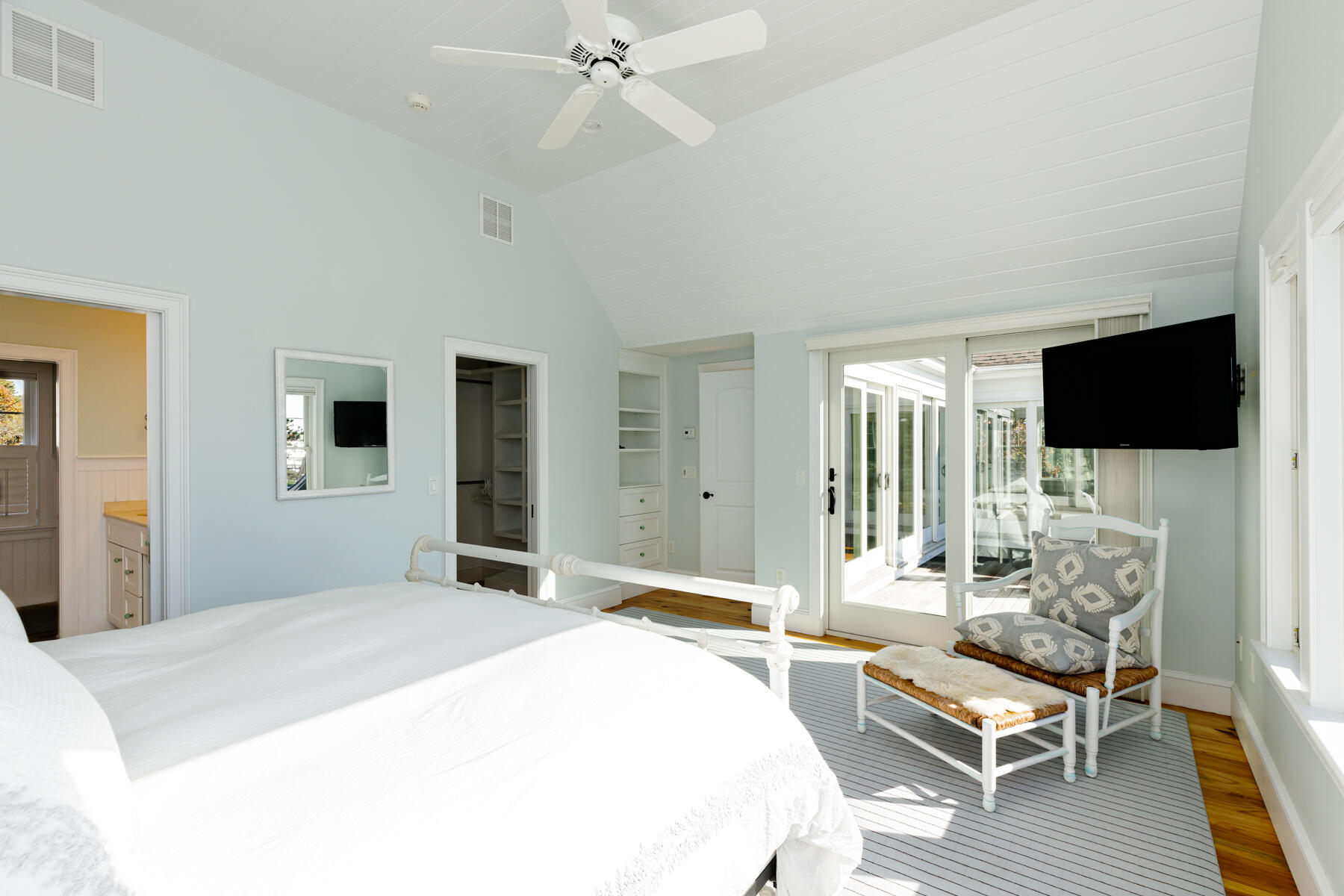 27 Patterson Road Chatham, MA 02633 - Photo 21 of 68 a bedroom with a bed and a flat screen tv