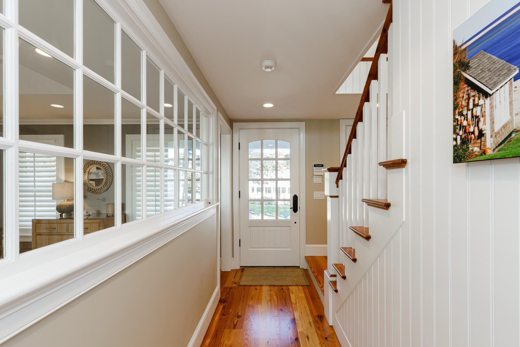 27 Patterson Road Chatham, MA 02633 - Photo 25 of 68 a view of a hallway with wooden floor and windows