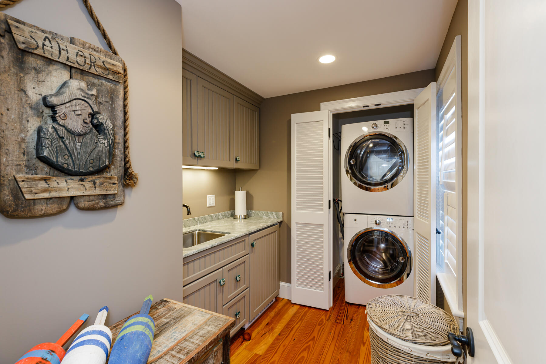 27 Patterson Road Chatham, MA 02633 - Photo 31 of 68 a view of a kitchen with washer and dryer