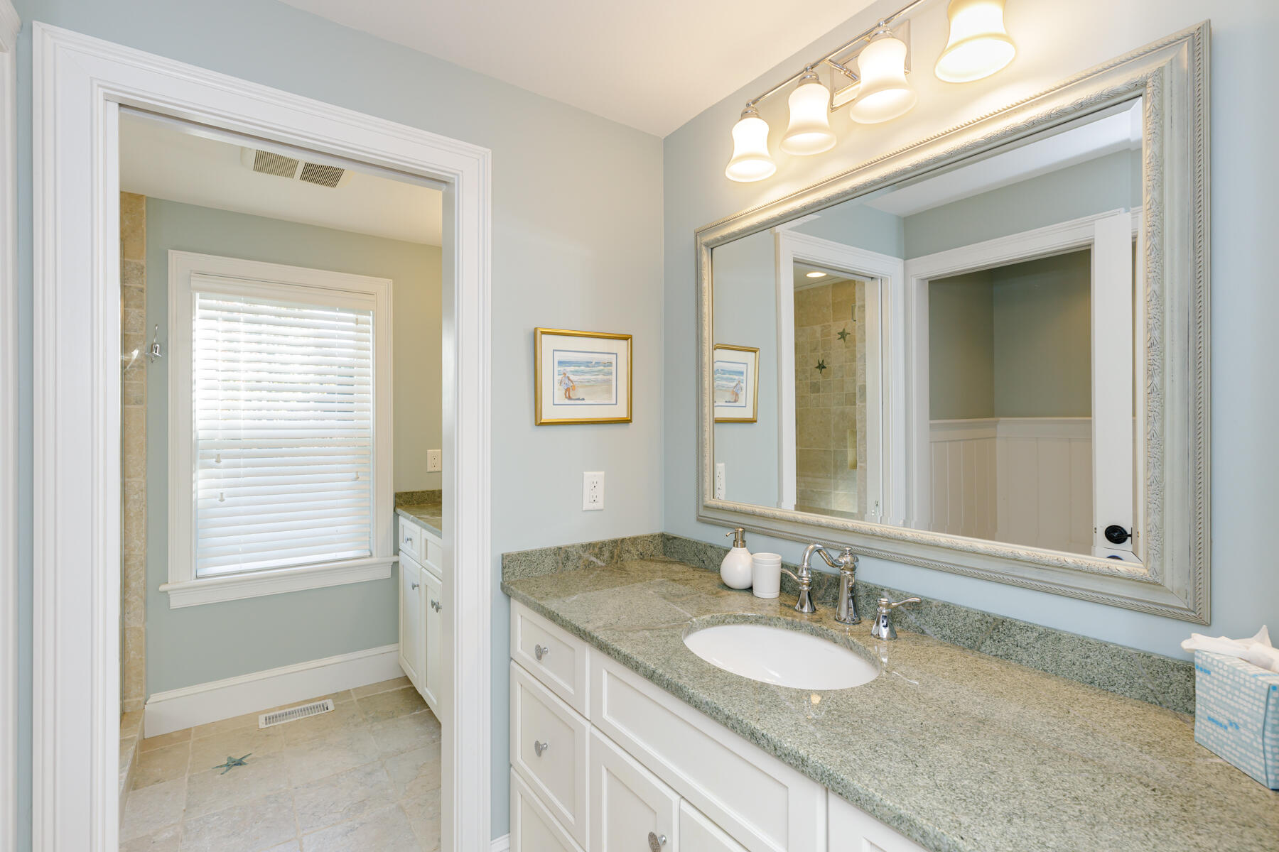 27 Patterson Road Chatham, MA 02633 - Photo 41 of 68 a bathroom with a granite countertop sink and a mirror