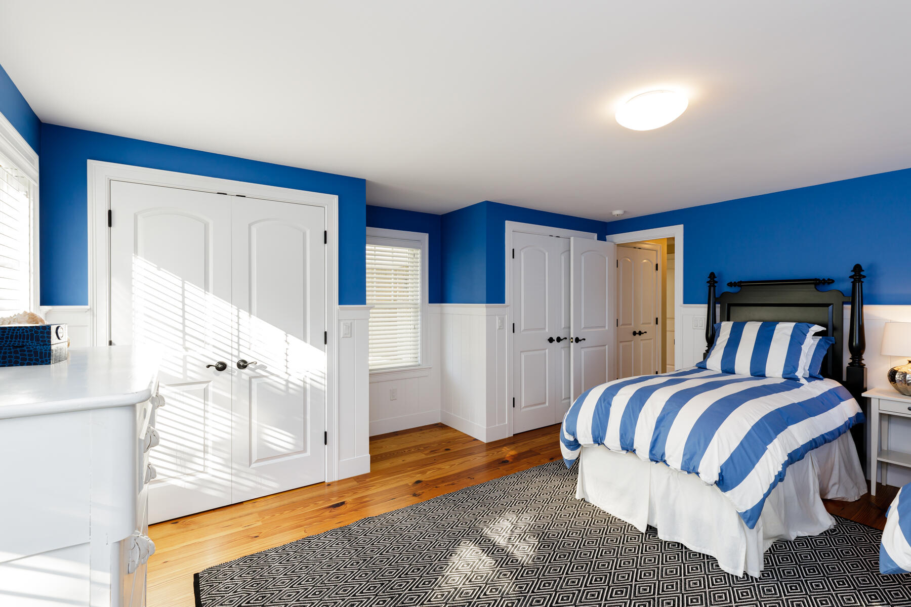 27 Patterson Road Chatham, MA 02633 - Photo 45 of 68 a spacious bedroom with a bed and a cabinets