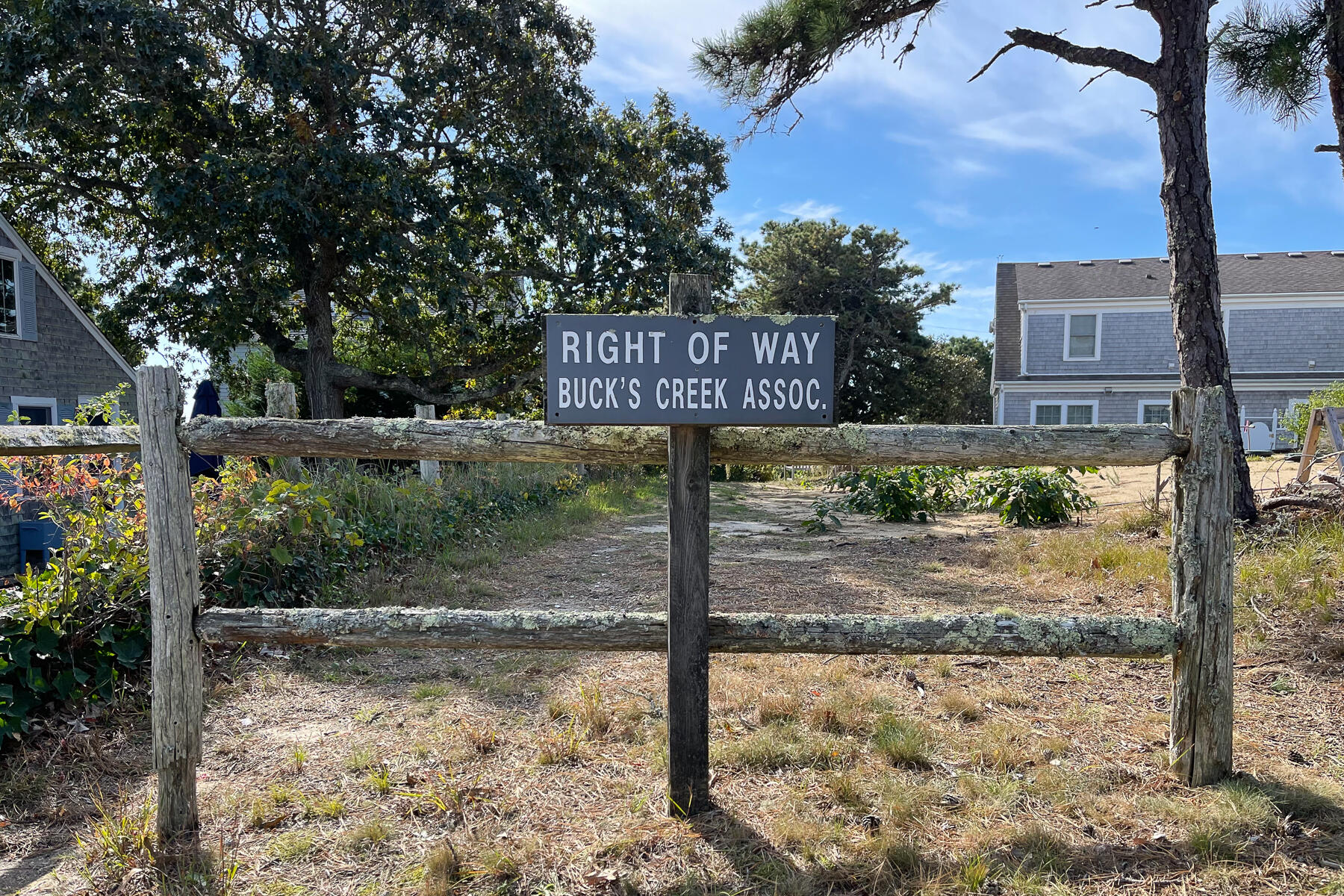 27 Patterson Road Chatham, MA 02633 - Photo 54 of 68 a view of a street sign and large trees
