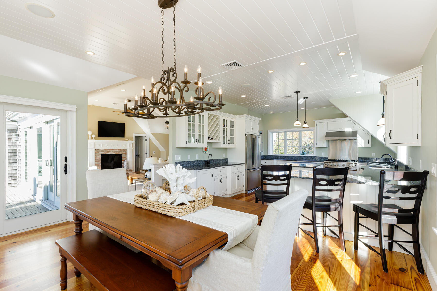 27 Patterson Road Chatham, MA 02633 - Photo 9 of 68 a view of a dining room with furniture and wooden floor