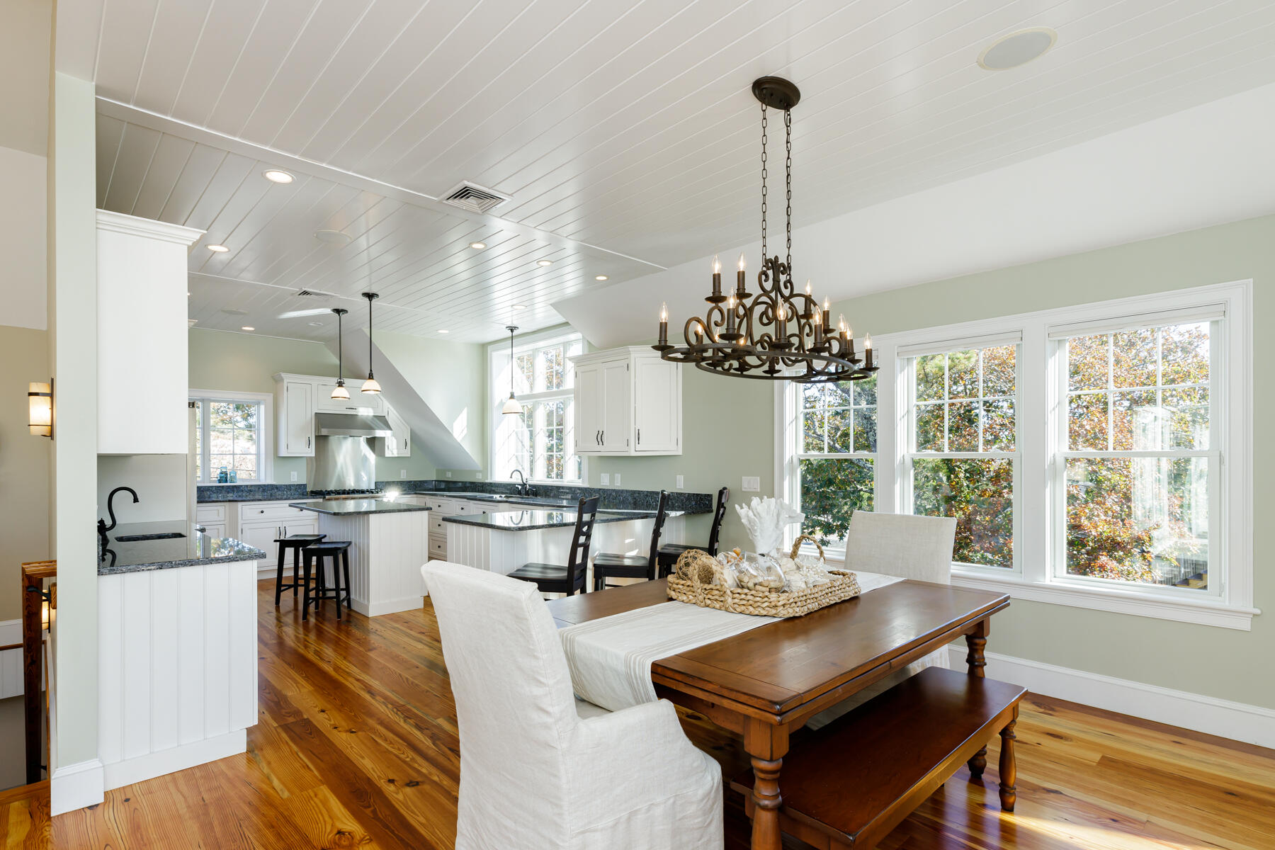 27 Patterson Road Chatham, MA 02633 - Photo 10 of 68 a living room with furniture a table and chairs