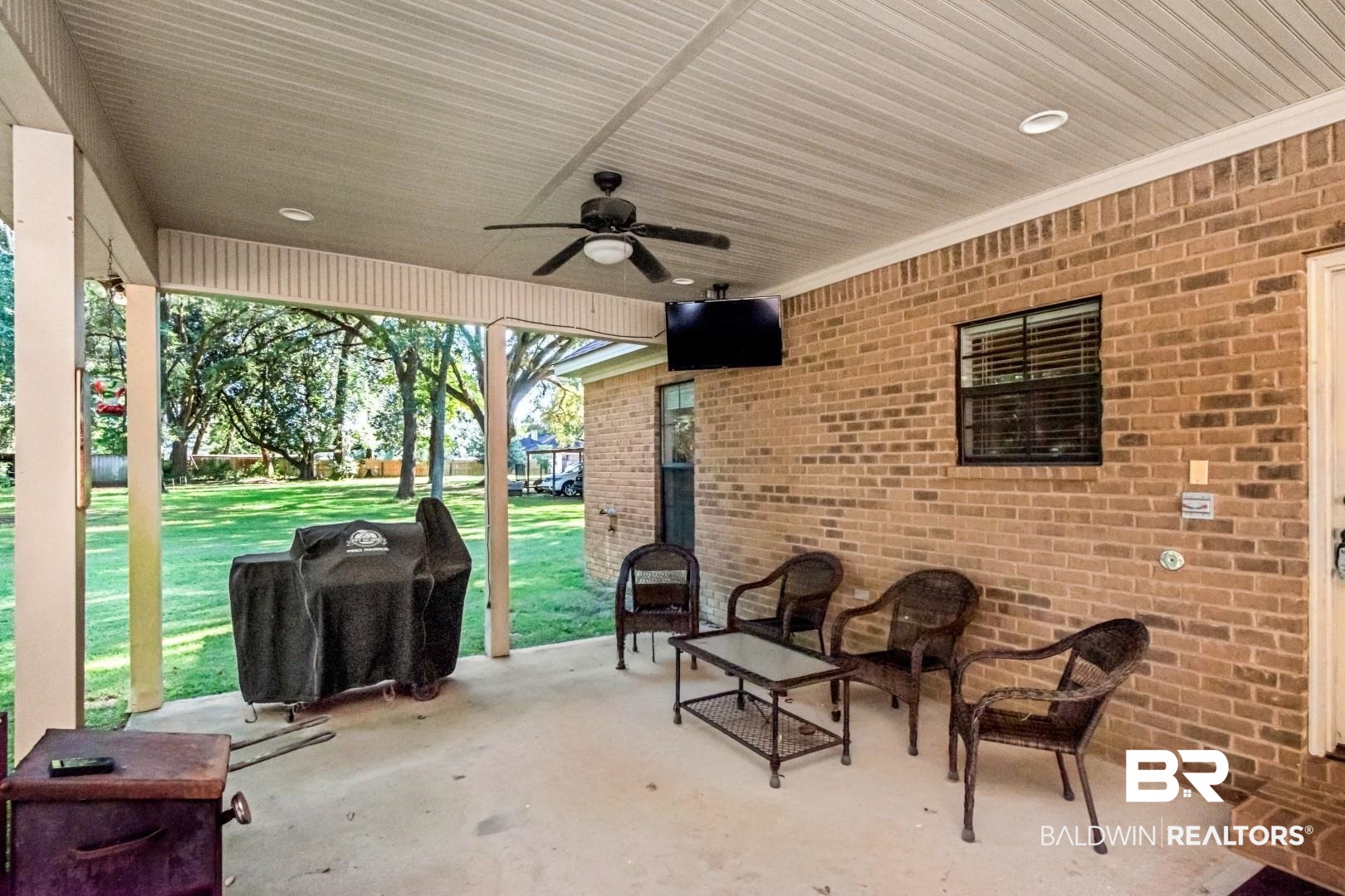 1360 Dykes Road North Mobile, AL 36608 - Photo 27 of 40 View of patio with a grill and a ceiling fan