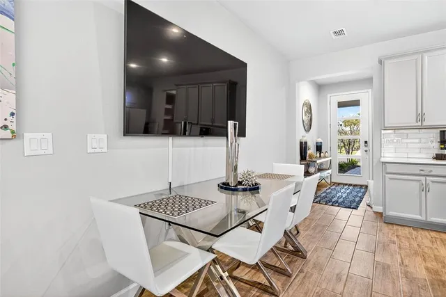 a kitchen with a sink and stove