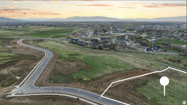 1906 South Preserve Drive, Unit 55 Mapleton, UT 84664 - Photo 2 of 19 Aerial view at dusk of a mountain view and a residential view