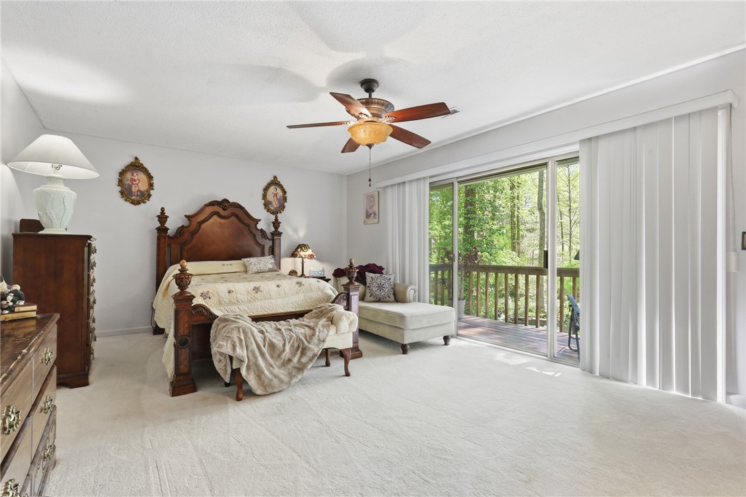 110 Shaftsbury Road Clemson, SC 29631 - Photo 13 of 38 This inviting bedroom provides direct access to a tranquil outdoor retreat.