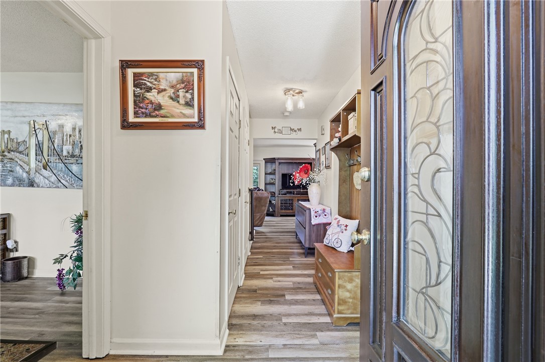 110 Shaftsbury Road Clemson, SC 29631 - Photo 3 of 38 Step inside this inviting home featuring an elegant entry and flowing wood flooring.