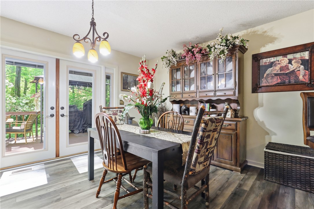 110 Shaftsbury Road Clemson, SC 29631 - Photo 6 of 38 This inviting dining area features elegant flooring and convenient outdoor access.
