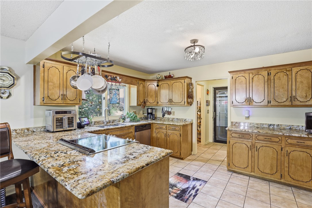 110 Shaftsbury Road Clemson, SC 29631 - Photo 8 of 38 This spacious kitchen offers ample counter space and abundant storage, perfect for culinary endeavors.