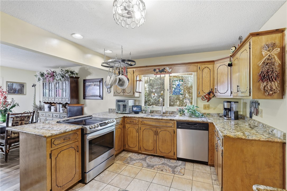 110 Shaftsbury Road Clemson, SC 29631 - Photo 9 of 38 This spacious kitchen offers ample countertop space and a functional layout, perfect for everyday living.