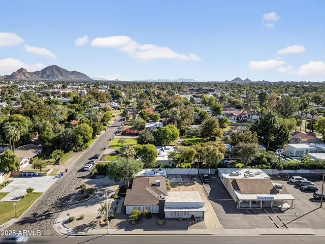 an aerial view of a city with lots of residential buildings