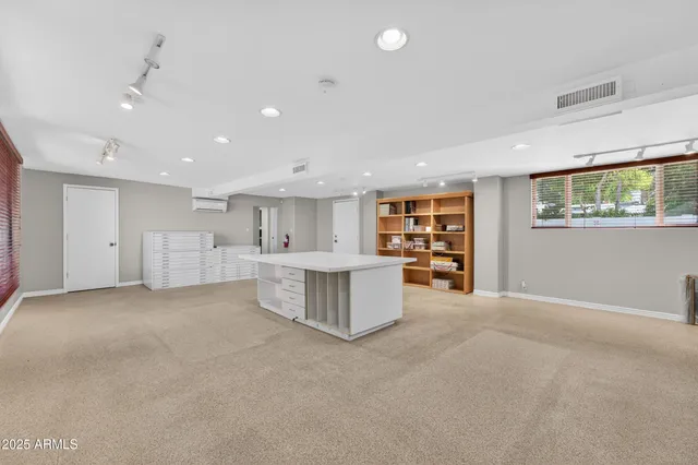 a view of kitchen with furniture and window
