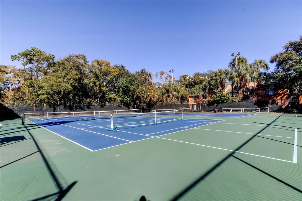 3650 41st Way South, Unit A St. Petersburg, FL 33711 - Photo 3 of 35 a tennis court view