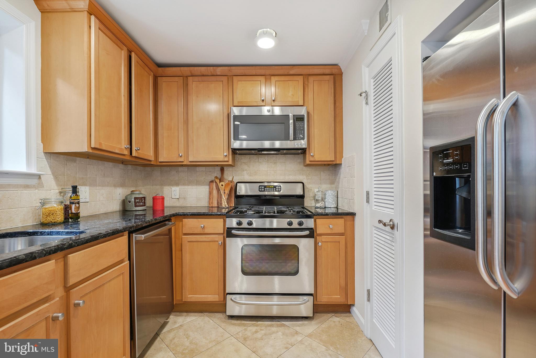 7527 Maple Avenue, Unit 4 Takoma Park, MD 20912 - Photo 12 of 30 Renovated Kitchen with Stainless Steel Appliances