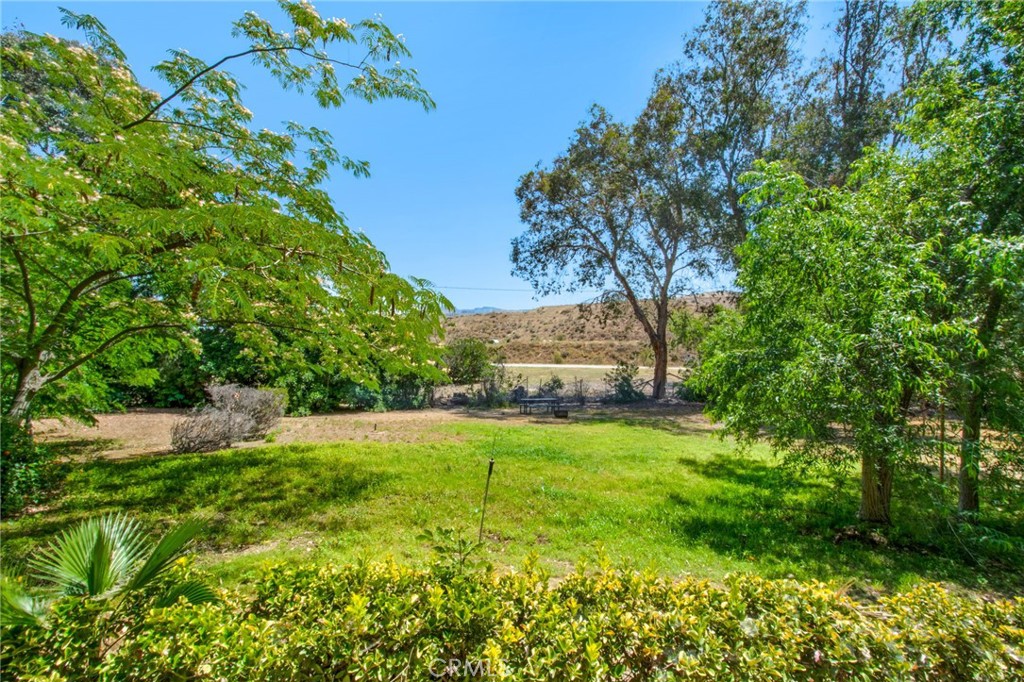 7241 Old Temescal Road Corona, CA 92881 - Photo 3 of 47 a view of backyard with swimming pool
