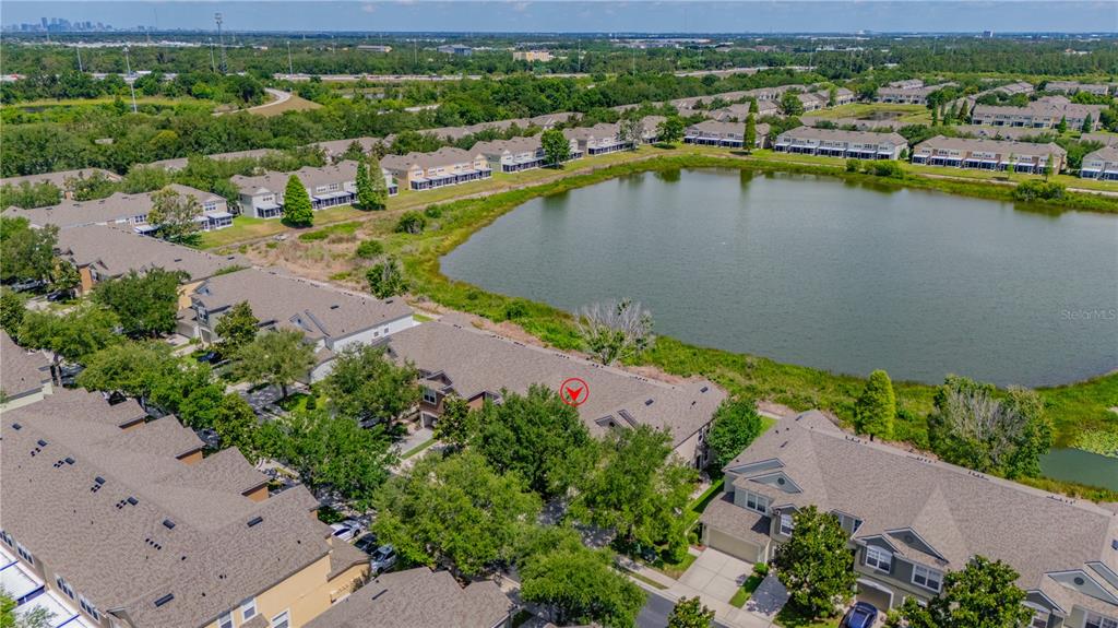 4939 Pond Ridge Drive Riverview, FL 33578 - Photo 3 of 25 an aerial view of a house with a lake view