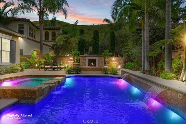a view of swimming pool with outdoor seating