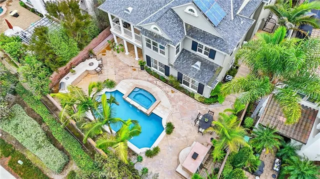a aerial view of a house with a yard